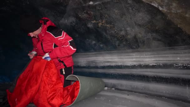 Guy Goes Sleep Sleeping Bag Ice Cave Preparing Bed Red — Stock videók