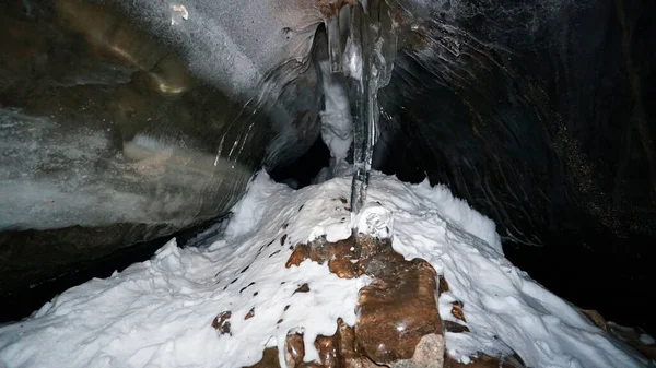 Black Transparent Color Ice Cave Small Stones Hang Places Frozen — Stockfoto