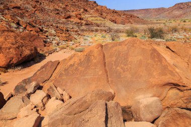 Twyfelfontein, site of ancient rock engravings in the Kunene Region of north-western Namibia. Prehistoric Bushman engravings, rock painting. clipart