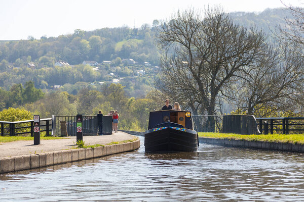 Llangollen, Dengighshire Wales - 21 April 2019: Narrow boats on the Llangollen Canal as it crosses the Pontcysyllte aquaduct, a world heritage site.
