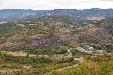 Picturesque summer mountain landscape of Nagorno-Karabakh in the vicinity of the city of Susa. clipart