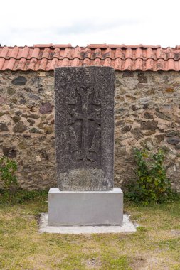 Vank, Nagorno-Karabakh, Azerbaijan - 04 September 2019: Graves with religion symbols in Gandzasar Monastery.13-th century Gandzasar Monastery near Vank. clipart