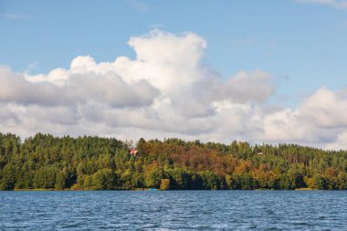 Radunskie Lake, a ribbon lake located in the Kashubian Lake District. Post-glacial valley. Pomerania.Poland. clipart