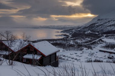 View of the Bjorkliden, Lapland Resorts. Tornetrask Lake in the background. Winter season. Lapland, Sweden.