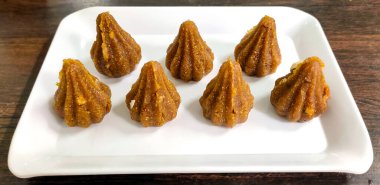 Hindistan 'daki festival sezonunda Tanrı Ganesh' e Süt ve Şeker Festivali için Modak sunuldu. Seçici odak