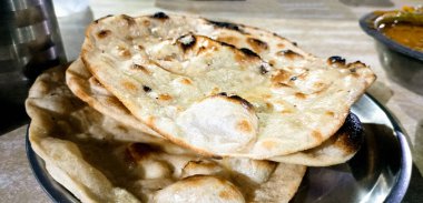 Tandoori Nan, Clay Oven 'da pişirilmiş geleneksel yassı ekmek. Hindistan ve Asya ülkelerinde meşhurdur.