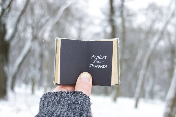 Explore Dream Discover Concept Hand Holds Book Inscription — Stock Photo, Image