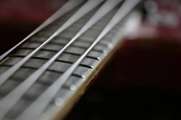 Vintage bass guitar strings, close up. Electric Bass Guitar.