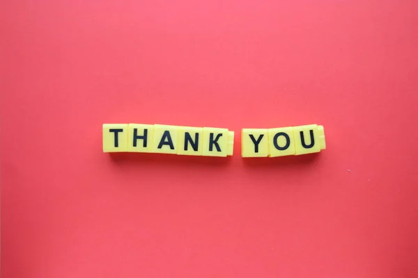 Thank You Concept Inscription Yellow Letters Red Background Rechtenvrije Stockfoto's