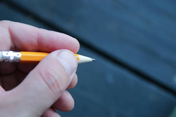 Hand Holding Pencil Vintage Background — Fotografie, imagine de stoc