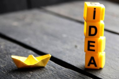 Idea creative concept, inscription on yellow cubes.