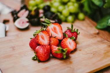 strawberries and nuts on board, fresh fruit or Appetizers table in Mexico Latin America