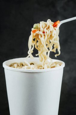 Instant noodles soup Cooked in the white plastic cup