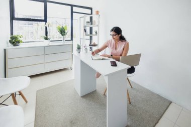 hispanic business woman working in her desk at office in Mexico Latin America