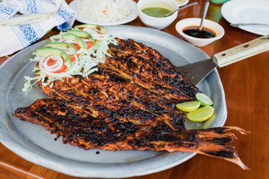 Meksika usulü ızgara Meksika balığı ya da Pescado a la Talla adında ızgara balık.