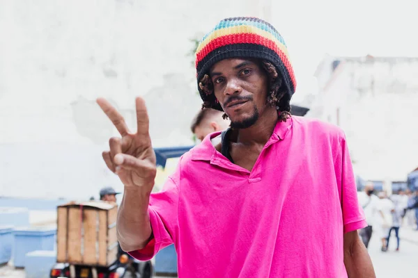 stock image African American man with dreadlocks and a purple T-shirt in Latin America, rastafarian or rastaman caribbean people