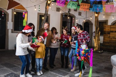 Mexican Posada, hispanic family Singing carols in Christmas celebration in Mexico Latin America culture and traditions clipart