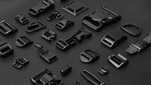 Accessoires Pour Vêtements Noir Sur Fond Noir Collage Fastex Élastiques — Photo