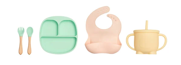 Farklı renklerde silikondan yapılmış ve beyaz arka planda çekilmiş çocuklar için yemekler. Tabaklar, kaşıklar, bardaklar..