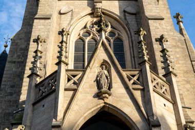 Classical interior of Catholic cathedral on the city streets. European building of church with towers