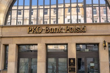 Katowice, Poland - September 20, 2022: Logo of bank in Poland. Facade of the building of PKO Bank Polski (Powszechna Kasa Oszczednosci Bank Polski).