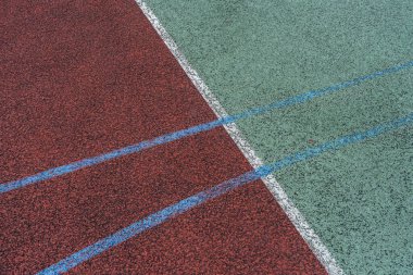 Close up of a basketball court, lines, colors. Abstract, minimal background