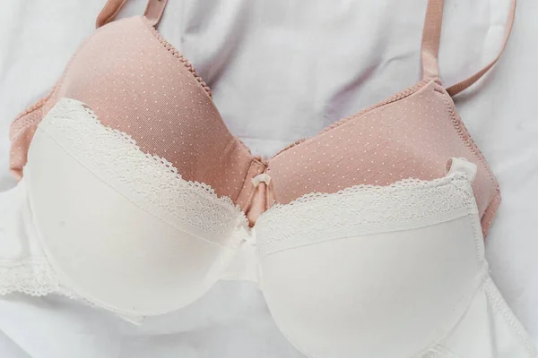 White Pink Bras Bed Women Tender Lingerie Underwear Top View — Stock Photo, Image