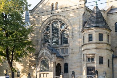 Classical interior of Catholic cathedral on the city streets. European building of church with towers