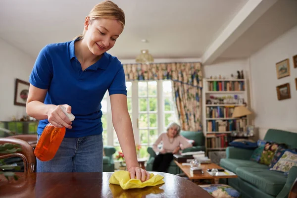 Female Home Help Cleaning House Talking Senior Woman — Stock Photo, Image