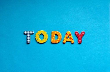 colored text  today on blue paper background