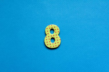 number eight on blue paper background