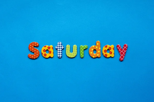 Colored Word Saturday Blue Paper Background — Stock Photo, Image
