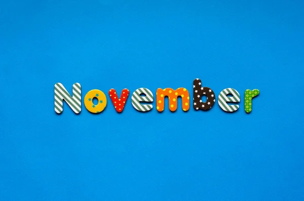 Gekleurde Tekst November Blauw Papier Achtergrond — Stockfoto