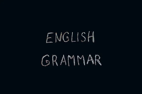 text English grammar on blackboard