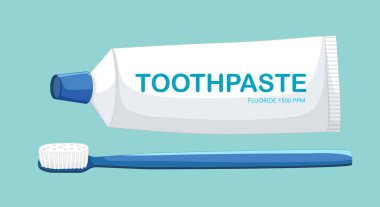 Mavi arka planda diş macunu tüpü ve diş fırçası