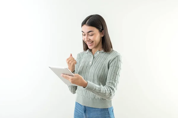 Happy Smiling Young Girl Reads Good News Tablet She Likes — Stock Photo, Image