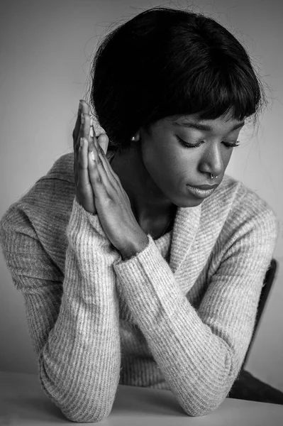Pensive young african american woman thinking of relationships problems - Thoughtful black woman feel despair lost in thoughts consider life trouble or drama - Vertical, Black and white editing