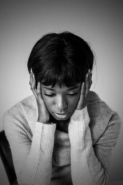 Young african american woman with depression problems - Treatment of emotional and mood disorders - Black and white editing