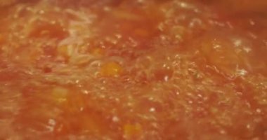Boiling soup. Slow motion video of boiling soup. High quality 4k footage