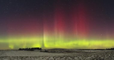 Northern lights - Aurora borealis dancing in the night sky. High quality 4k footage