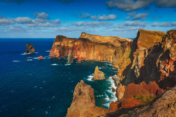 Volcanic Sea Cliffs of Sao Lourenco Peninsula: Majestic Beauty and Geological Wonders. High quality photo