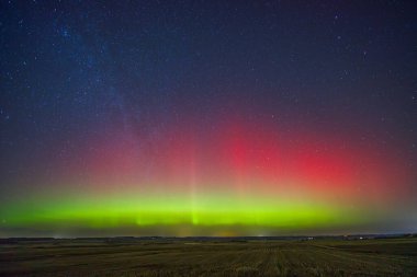 Northern lights - Aurora borealis dancing in the night sky. High quality photo