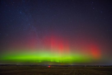 Northern lights - Aurora borealis dancing in the night sky. High quality photo