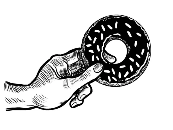 Hand holding a doughnut. Hand-drawn black and white illustration