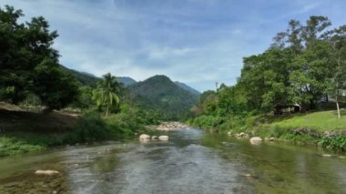 Aerial view drone fly through bridge, Khiriwong village, Nakhon Si Thammarat, Thailand