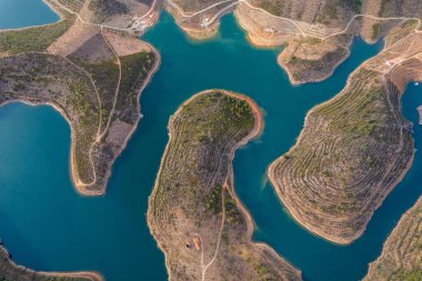 Amazing abstract landscape of Sabor lake, Tras os Montes  Portugal. Drone vision, aerial view of Serpente do Medal, Sabor River, tourist attraction and travel destination in Northern Portugal. clipart