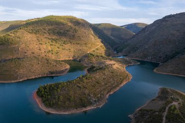 Amazing abstract landscape of Sabor lake, Tras os Montes  Portugal. Drone vision, aerial view of Serpente do Medal, Sabor River, tourist attraction and travel destination in Northern Portugal. clipart