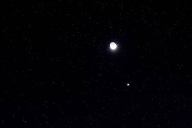 The Moon and the planet Venus in conjunction. clipart