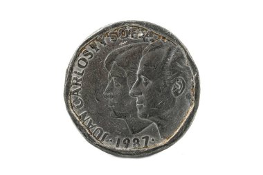 500 pesetas coin from 1987 with King Juan Carlos I, historical-era counterfeit in tin alloy. clipart