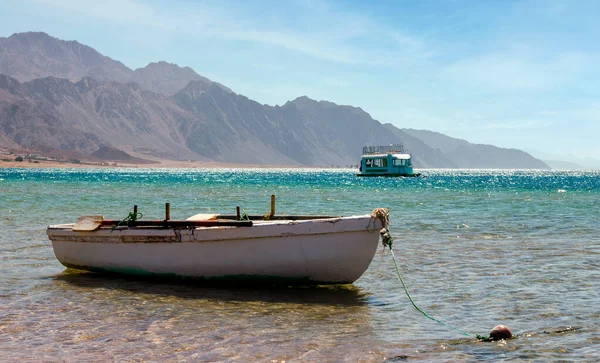 old wooden fishing boat near the coast of the red sea in egypt without people